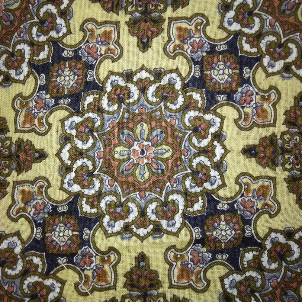 FABRIC Vintage Brown on gold regularly set stylized medallions 1 yd +